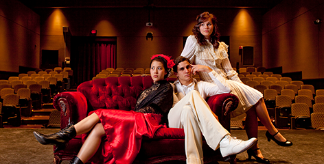 Actor and actresses posing on stage