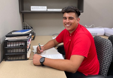 student working at desk